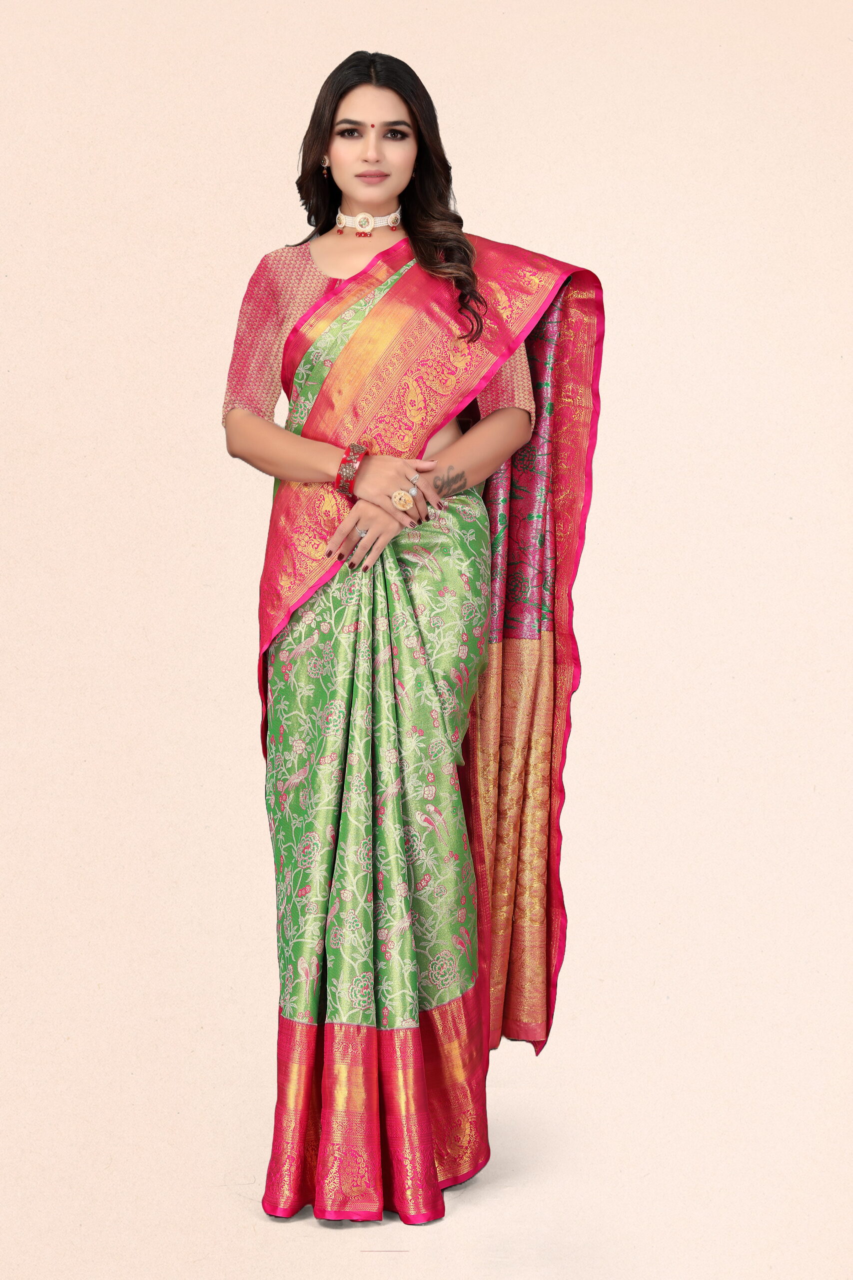 Dharmavaram pattu saree in Parrot Green & Rani Pink with Gold Zari Weaving